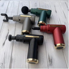 Перкуссионный массажер для тела с 4 насадками Gun Massager